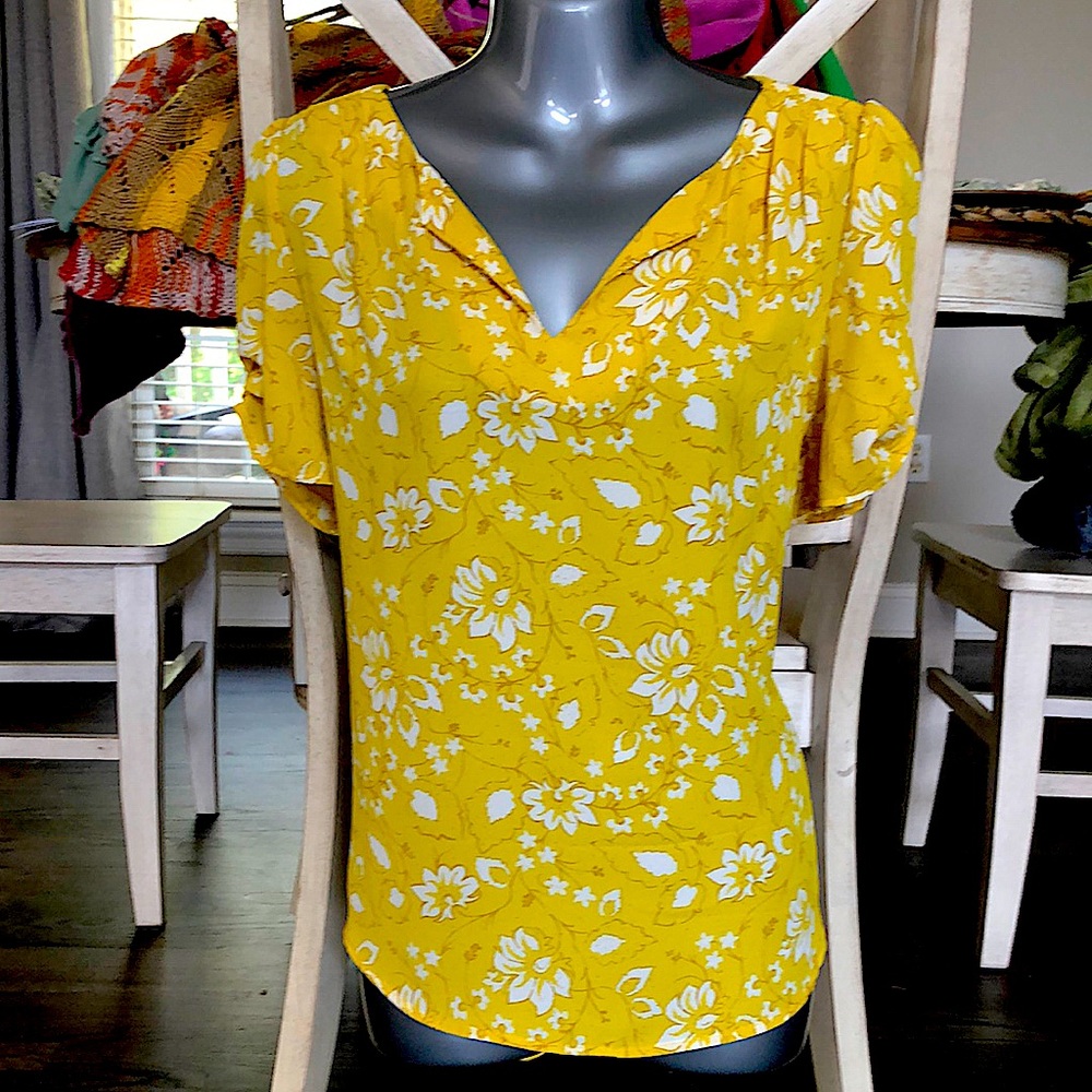 Beautiful yellow flower print top.  Never worn.
